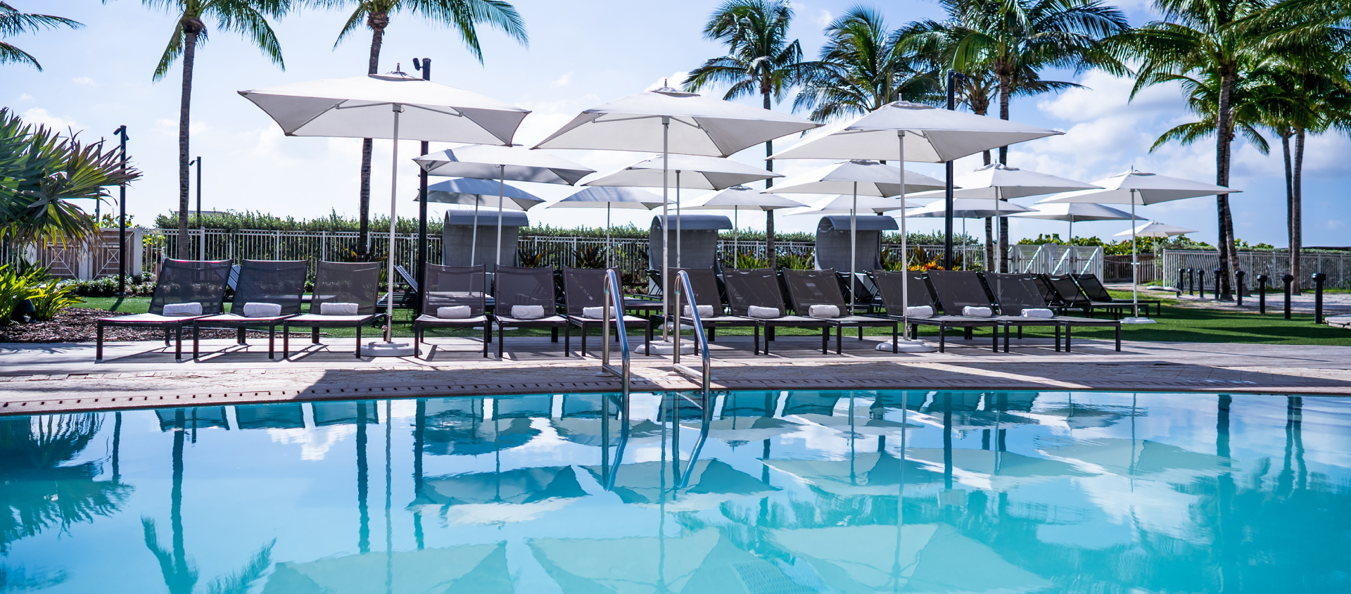 Pool and loungers at Eden Roc