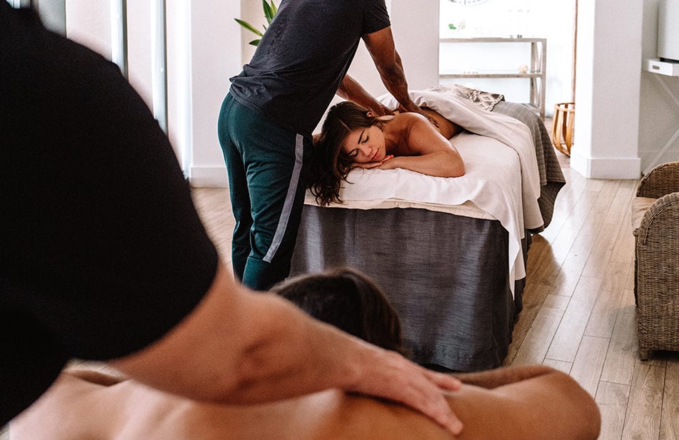 A woman having a massage at the Spa at Eden Roc